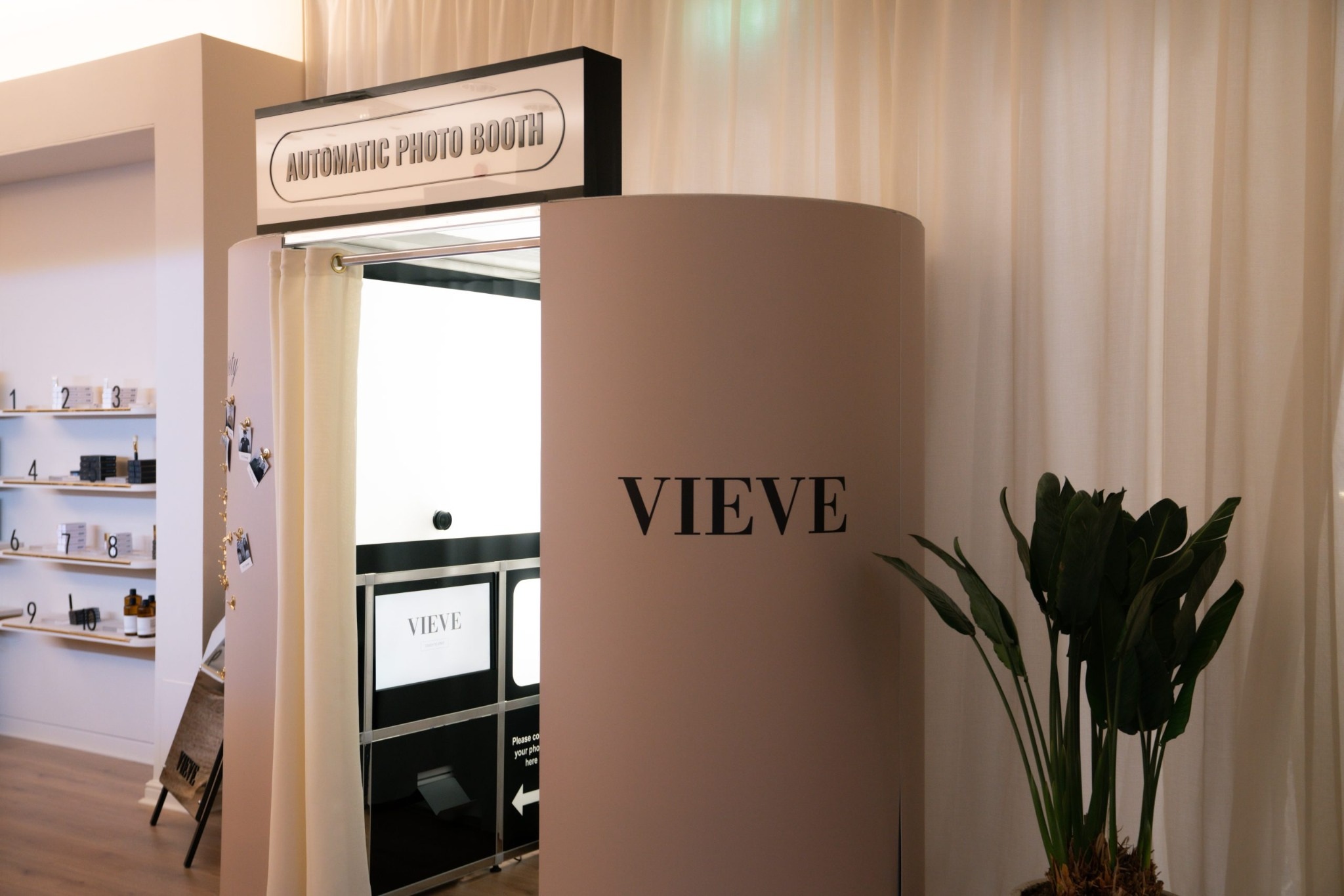 VIEVE branded enclosed photo booth presented inside a retail activation
